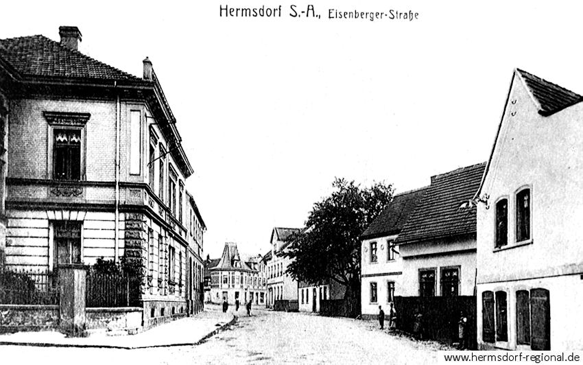 Blick in die Eisenberger Straße, mit dem Café Rühling und dem Haus Nr. 7 Bildmitte, um 1920